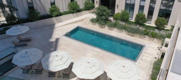 1 bedroom apartment with an expensive natural stone finish with a swimming pool