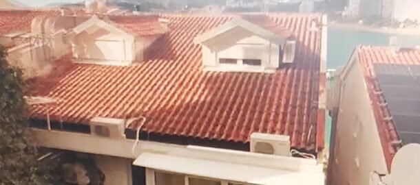 Bright new one-bedroom apartment in Rafailovići with sea views, rent for a year